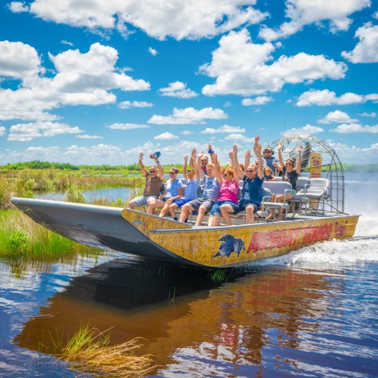 Everglades Airboat Ride with Happy Tourists
