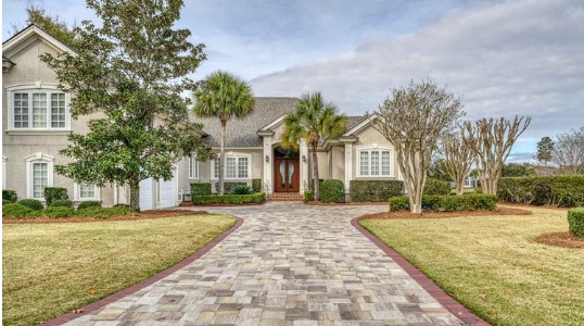 Straight paver driveway with decorative accent borders