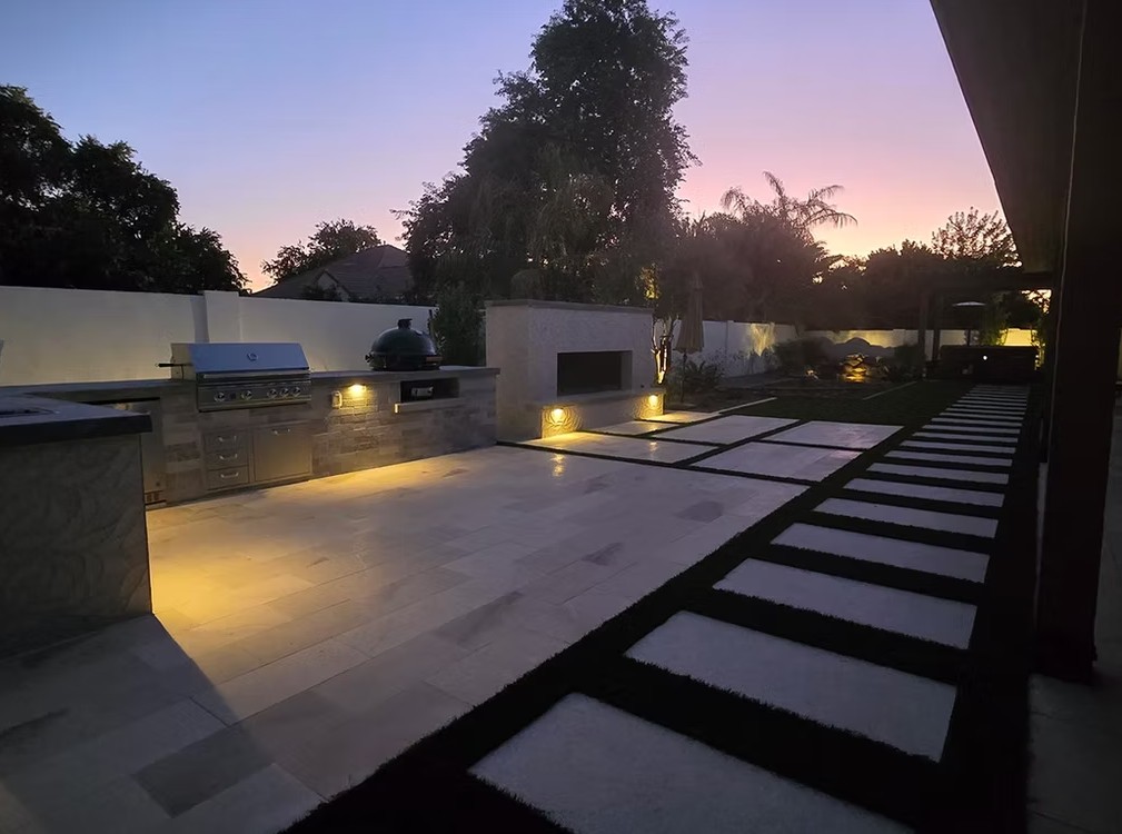Evening Patio with Accent Lighting and Grass Strips
