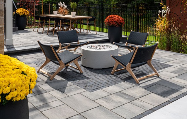 Grey Stone Patio with Fire Pit and Modern Seating
