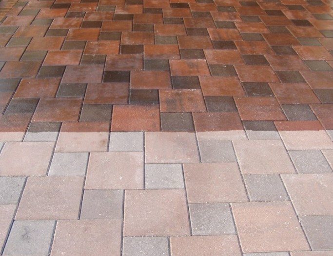 Dramatic sealed vs unsealed paver comparison showing color enhancement and protection benefits