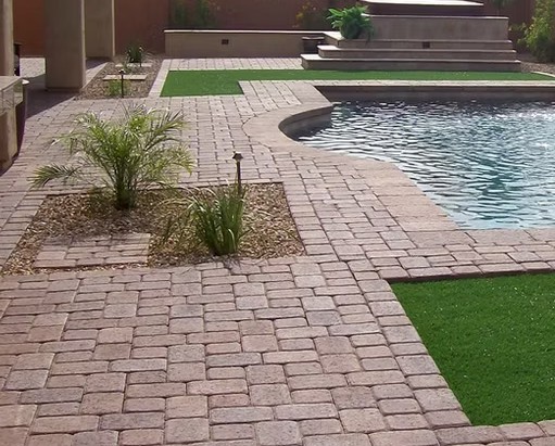Elegant Brick Paver Pool Deck with Landscaping - North Palm Beach