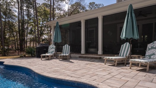 Brick Paver Pool Deck with Outdoor Umbrellas - Functional Design