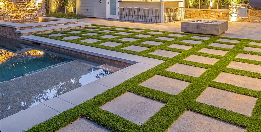 Modern Large Format Pool Deck with Grass Lines - Palm Beach County