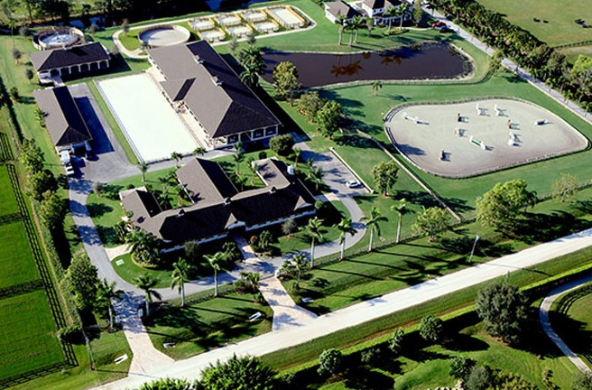 Aerial View of Luxury Equestrian Estate with Arenas